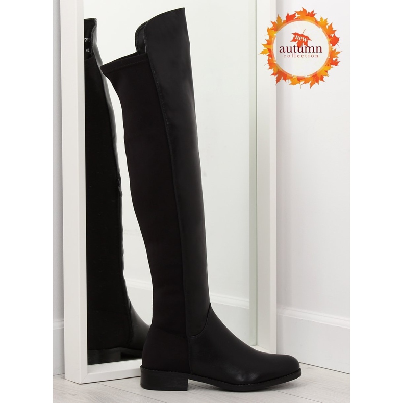 Black over-the-knee boots with a flexible uppers 1