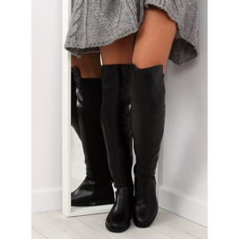 Black over-the-knee boots with a flexible uppers 2