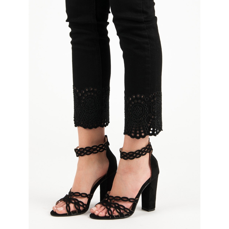 Laura Mode Black Sandals On A Bar 1