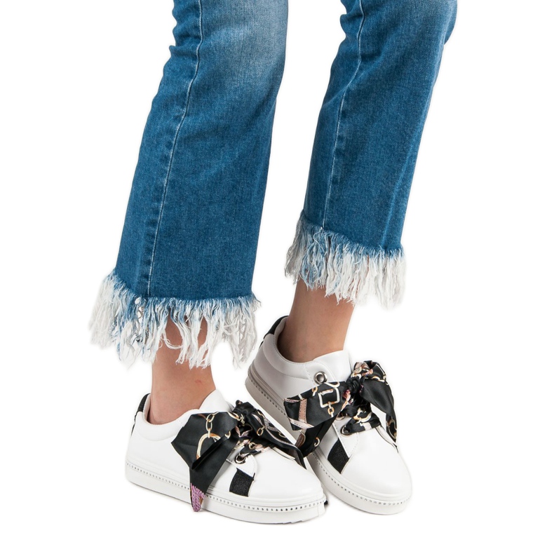 Sports Shoes Tied With A Ribbon white 2 Sports Shoes Tied With A Ribbon white 2
