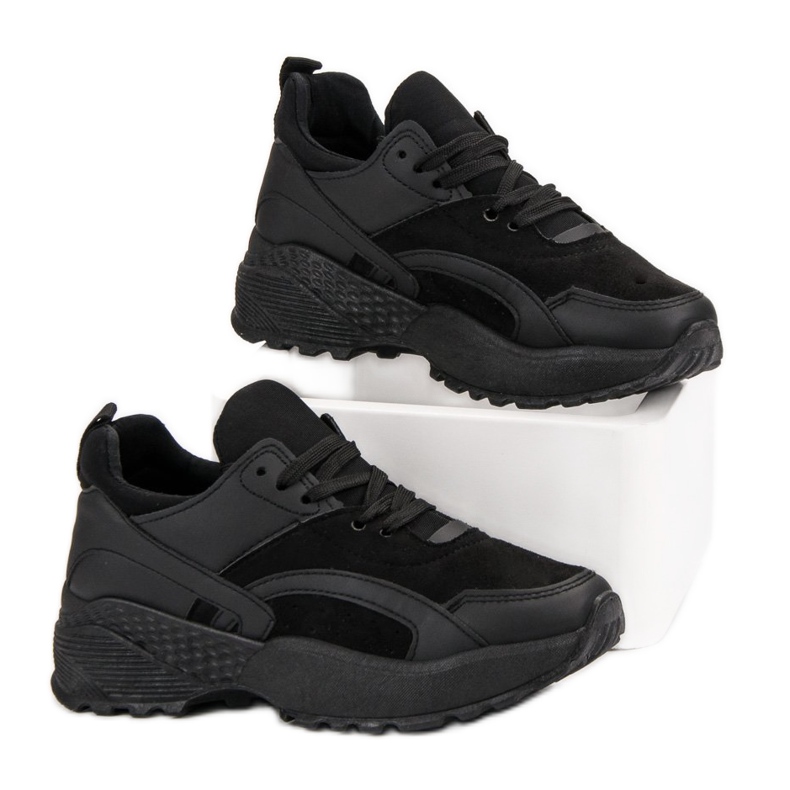 Small Swan Black Sneakers On The Platform 2