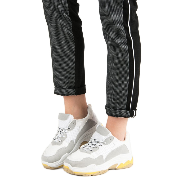 Small Swan White Sneakers On The Platform 1