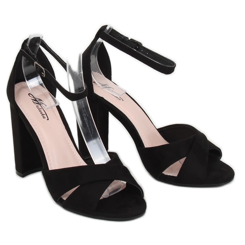 Black sandals on the post. 369-34 Black 1