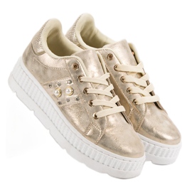 Golden Footwear On The Platform 1