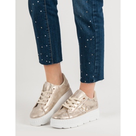 Golden Footwear On The Platform 2