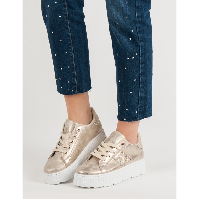 Golden Footwear On The Platform 2