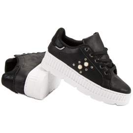 Black Shoes On The Platform 1