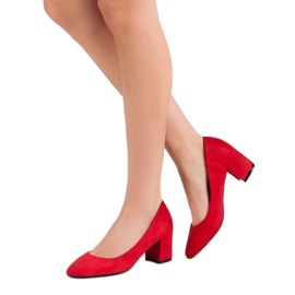 Ideal Shoes Red Pumps On A Pillar 2