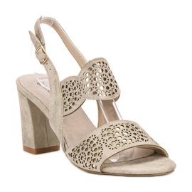 Goodin Golden Sandals On A Bar 1