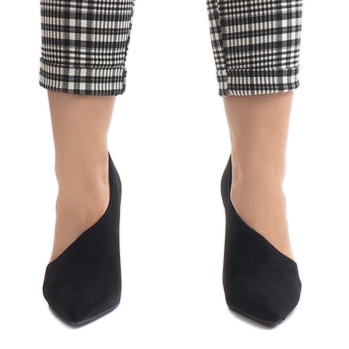 Black asymmetrical C82A heels 1