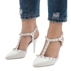 White lacquered heels with B-57 studs 1