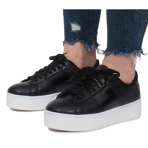 Black Sneakers On The Livet De Lux Platform 1