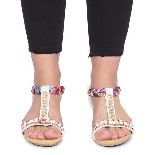 White sandals on a delicate Ruixin wedge heel 1