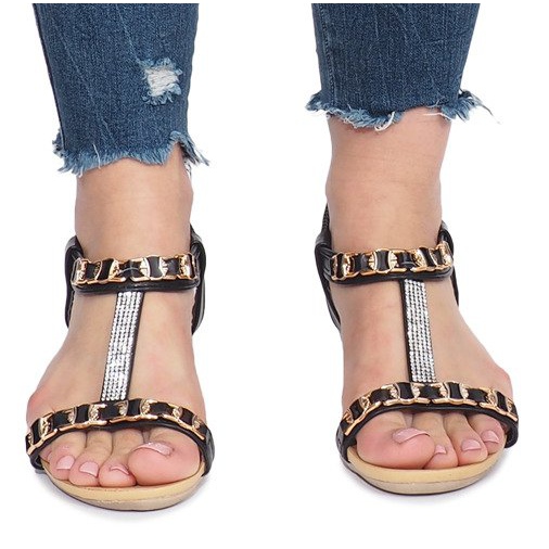 Black sandals on a delicate Tree wedge heel 1