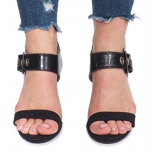 Black sandals on a Colier post 1