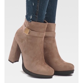 Pink boots on the post J-8682 1