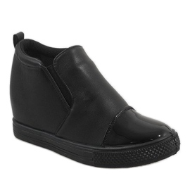 Black sneakers on the wedge DD409-1 1