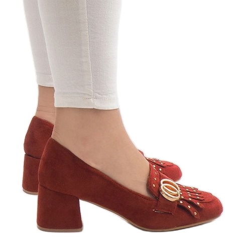 Red suede pumps on the X77 pillar 1