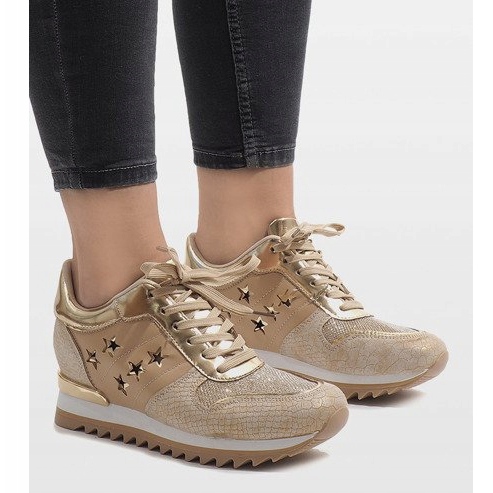 Golden sneakers on the wedge G-127 1
