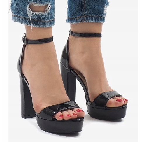 Black sandals on a varnished post 82985-7 2