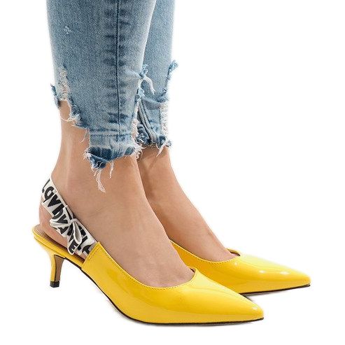Yellow pumps on a HD-28 heel 2