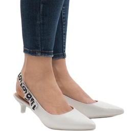 White pumps on a B-45 heel 1