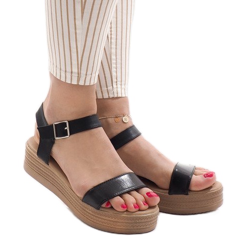 Black sandals on the platform 22-07 1