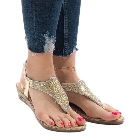Golden wedge sandals with an elastic FM4075 1