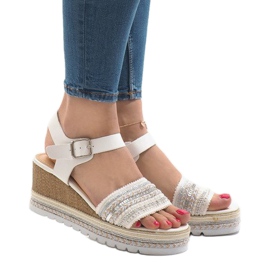 White decorated sandals on the wedge YRT-72-1 1