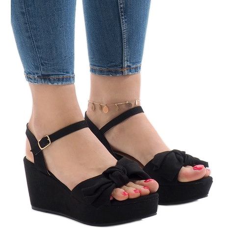 Black wedge sandals with a bow F055 1