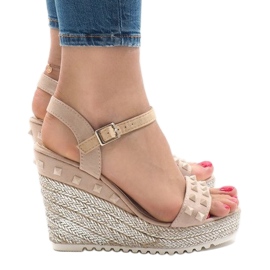 Beige suede wedge sandals with TS-16 studs 1