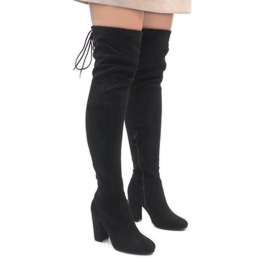 Black suede boots on the ZH811 post 1