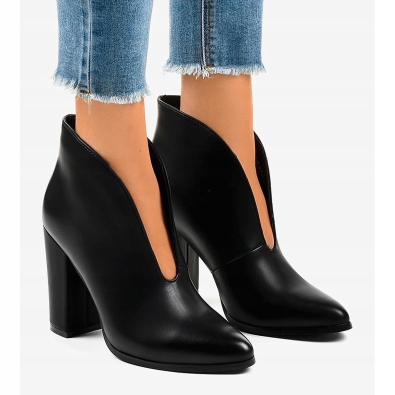 Black slip-on boots with cutouts on the RB38P post 1
