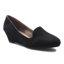 Black wedge pumps from Lordsy Malvine 2