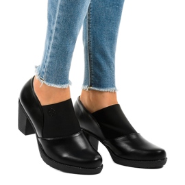 Black slip-on ankle boots on the TH-F198 post 1