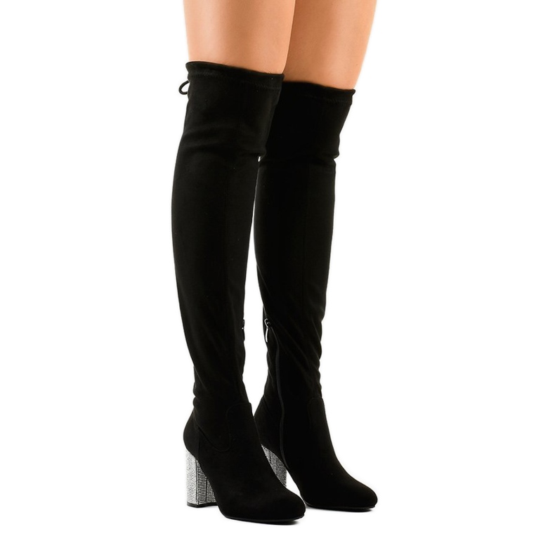 Black suede boots on a decorated post BM150 1