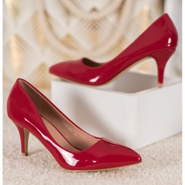 Small Swan Comfortable lacquered pumps 1
