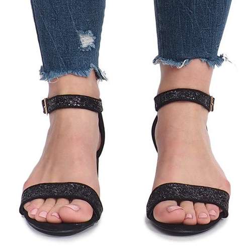 Black sandals on a Montana post 1