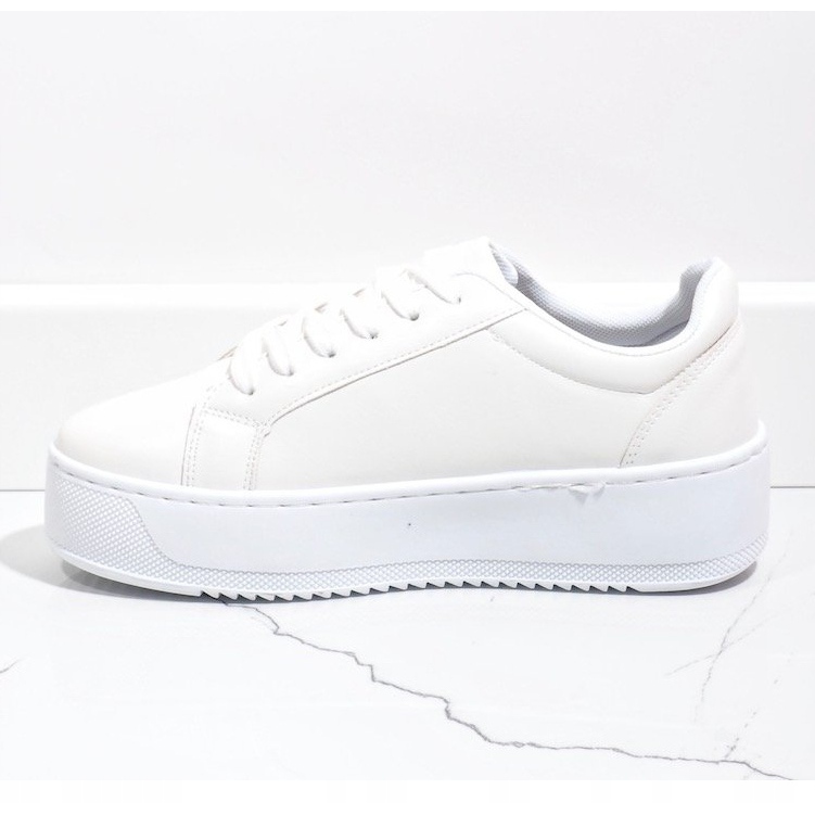 White sneakers on the 798 platform 1