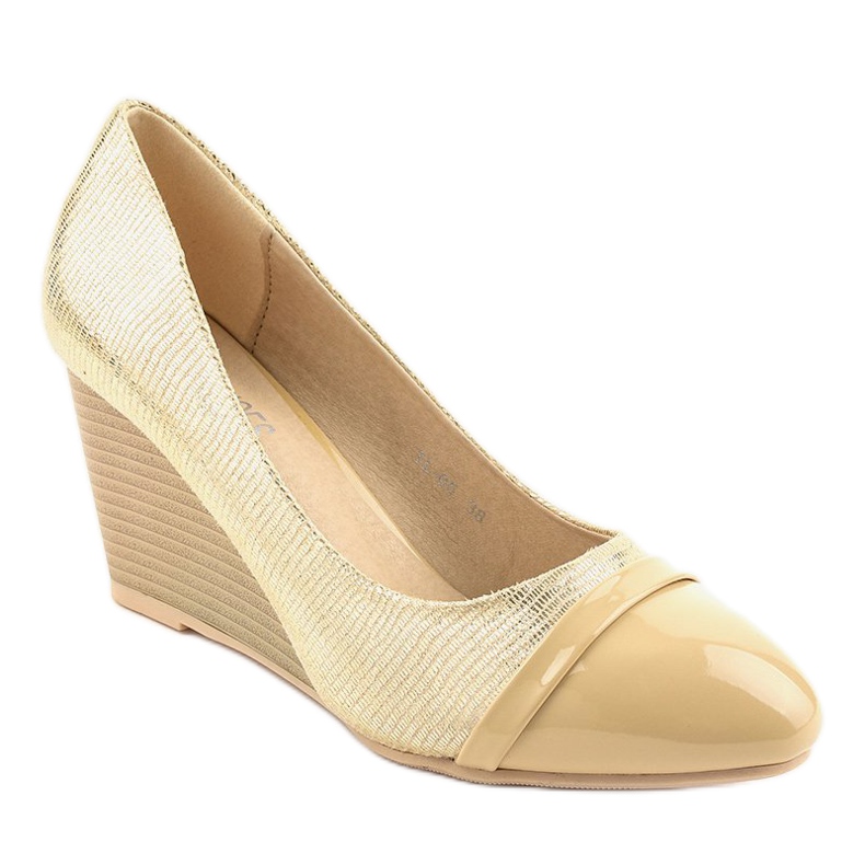 Beige pumps on the wedge TL-05 1