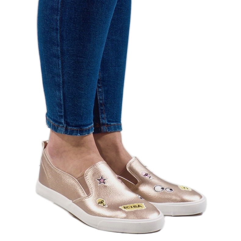 Golden sneakers with G82-5 prints 1