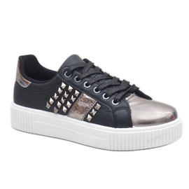 Black sneakers richly decorated with R213 studs 1