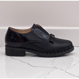 Black slip-on shoes with X528 studs 2