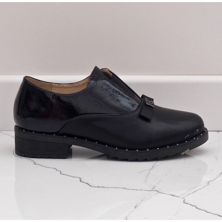 Black slip-on shoes with X528 studs 2