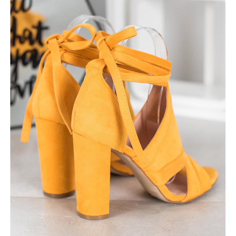 Seastar Tied Sandals On A Post yellow 1