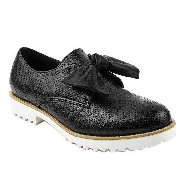 Black slip-on shoes with a RS-WED2 bow 1