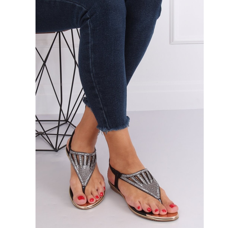 Flip-flops decorated with black M03 Black 1