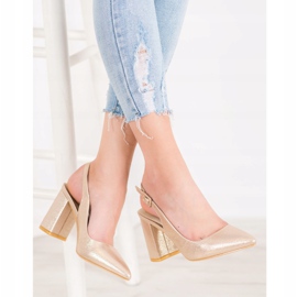 Comer Classic Pumps With An Open Heel golden 1