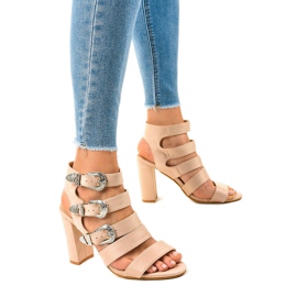 Beige sandals on a post with 8022 buckles 1