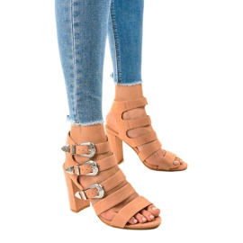Pink sandals on a post with 8022 buckles 1